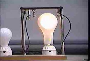 Bimetallic strip between two contacts powering different bulbs
