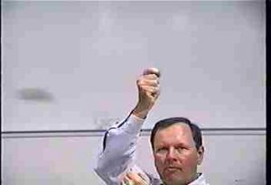 Instructor spinning the tuning fork or a string